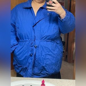 Winter coat from woman within.